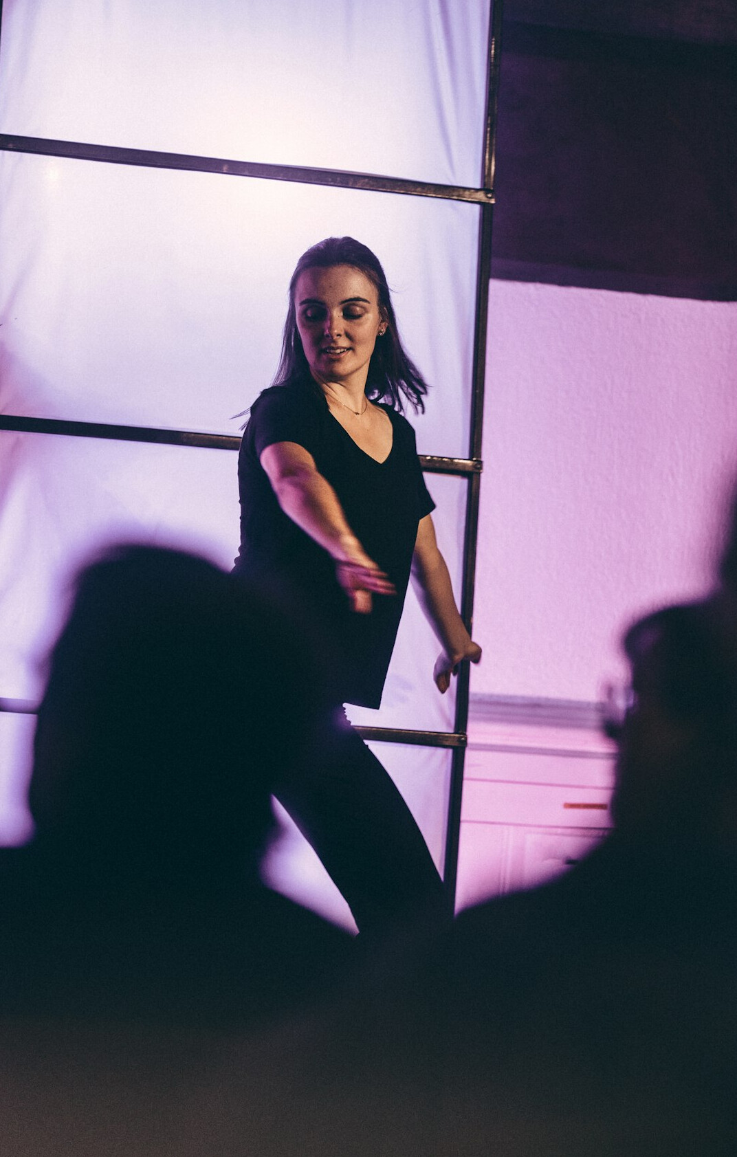 woman on stage performing