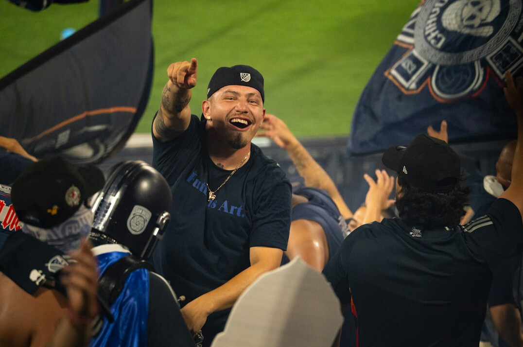 group of fans cheering
