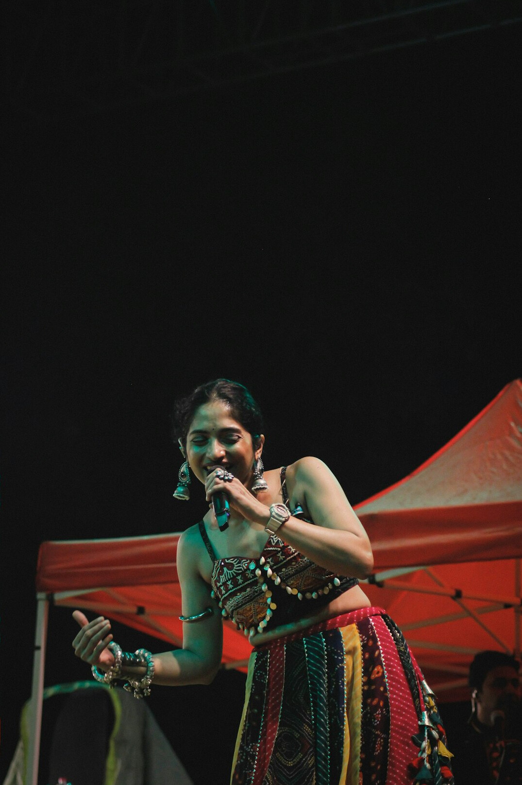 woman on stage performing